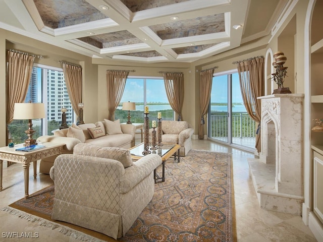 4931 Bonita Bay Blvd Unit 701, Bonita Springs, FL 34134 - living area featuring coffered ceiling, a fireplace, a water view, beamed ceiling, and ornamental molding