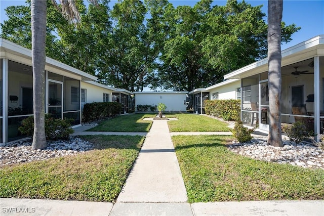 4916 Vincennes St Unit 1, Cape Coral, FL 33904 - view of yard with a sunroom