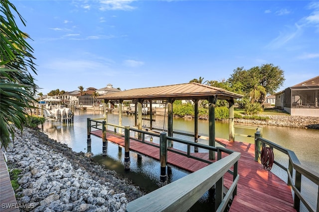 dock area featuring a water view