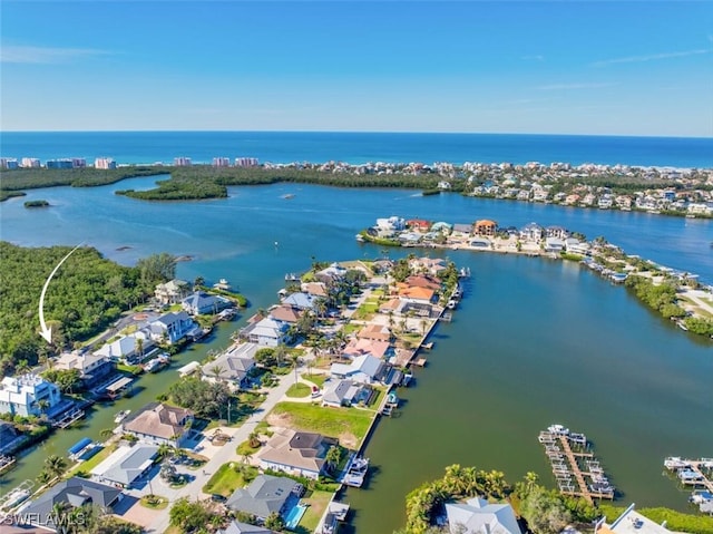 bird's eye view with a water view