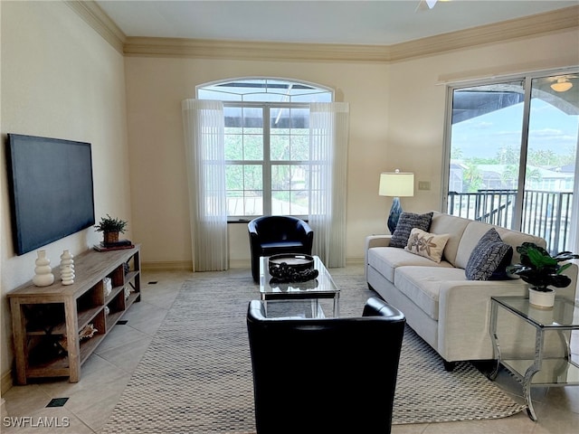 tiled living room with ornamental molding