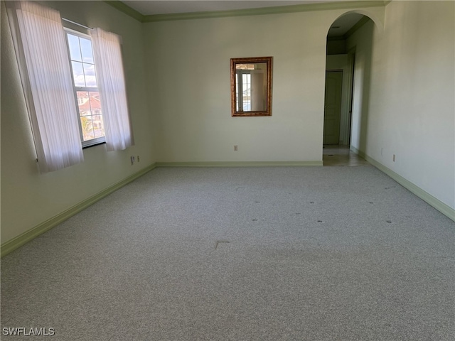 spare room featuring ornamental molding