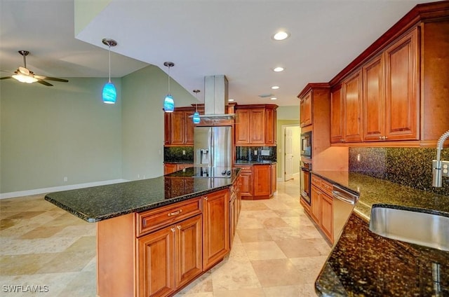 kitchen with tasteful backsplash, stainless steel appliances, a kitchen island, and dark stone counters