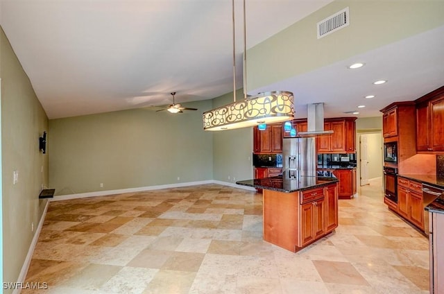 kitchen featuring decorative light fixtures, a kitchen island, island exhaust hood, dark stone counters, and black appliances