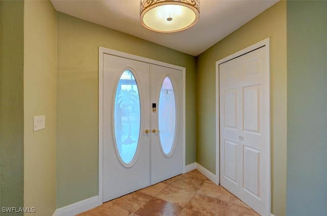 entrance foyer featuring french doors