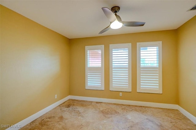 empty room featuring ceiling fan