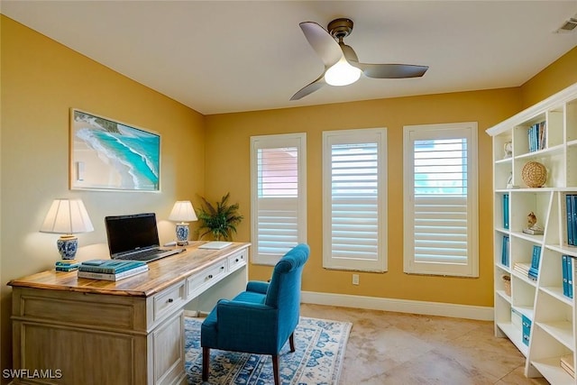 office area with ceiling fan