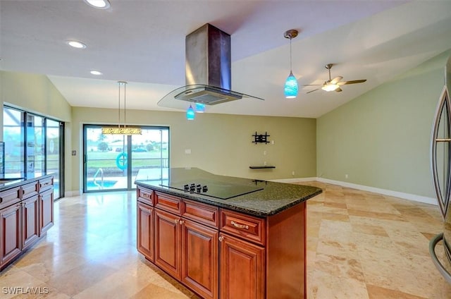 kitchen featuring pendant lighting, dark stone countertops, island exhaust hood, black electric cooktop, and vaulted ceiling