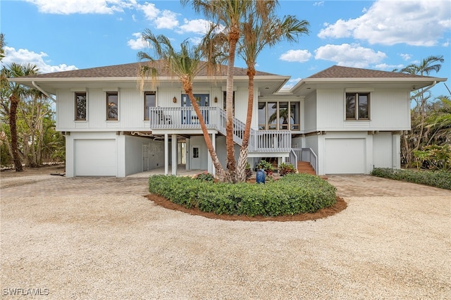 view of front of property with a garage and a porch