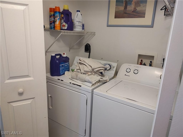 laundry room with separate washer and dryer