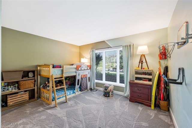 bedroom featuring light carpet