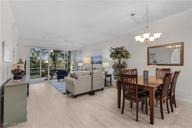 dining area featuring crown molding and ceiling fan with notable chandelier