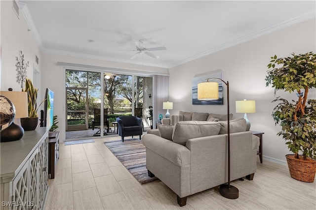 living room with crown molding and ceiling fan