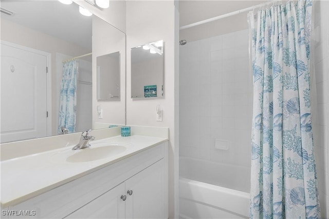 bathroom with vanity and shower / bath combo