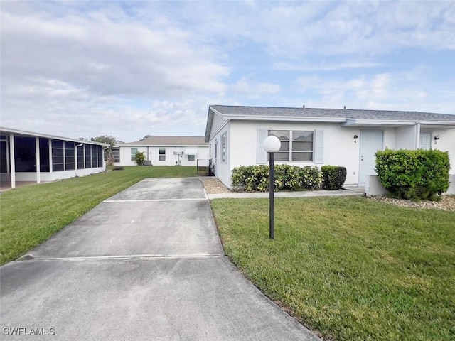 view of front of home with a front lawn