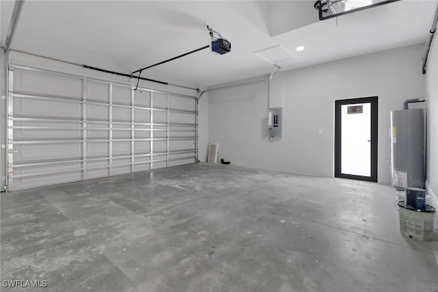 garage featuring electric panel, a garage door opener, and water heater