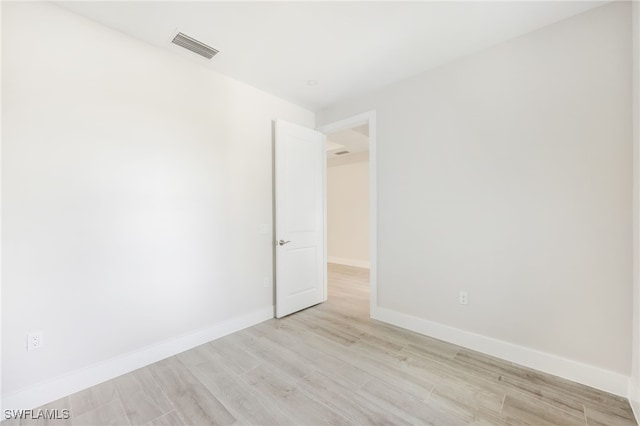 empty room featuring light hardwood / wood-style floors