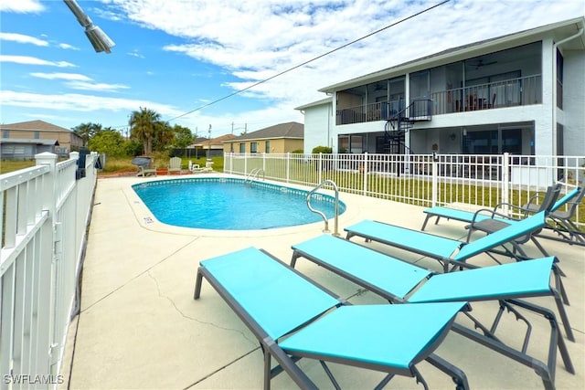 view of pool with a patio area