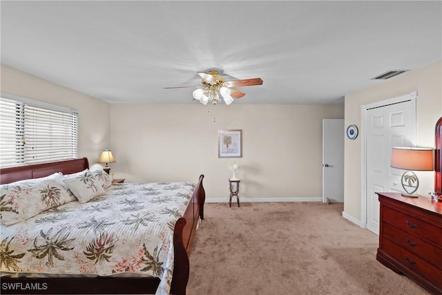 bedroom featuring ceiling fan and light colored carpet