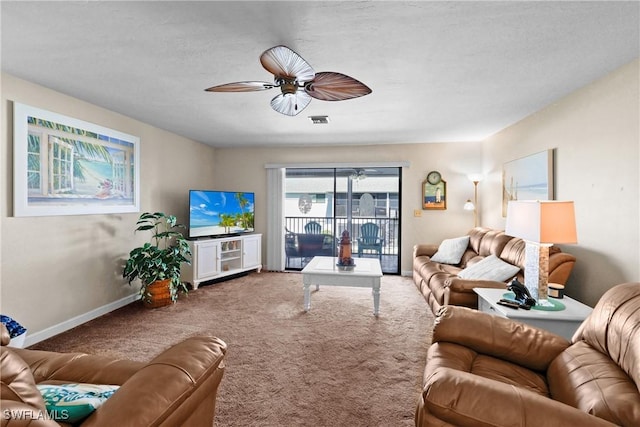 carpeted living room featuring ceiling fan