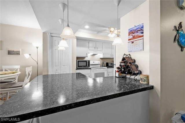 kitchen with white range with electric cooktop, kitchen peninsula, white cabinets, and decorative light fixtures