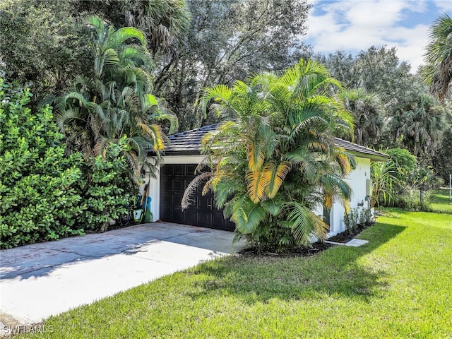 exterior space with concrete driveway