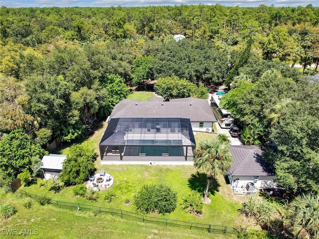 bird's eye view featuring a forest view