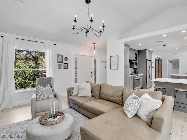 living area with lofted ceiling, light wood-style flooring, visible vents, baseboards, and ornamental molding