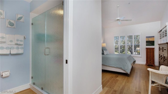 bedroom featuring ceiling fan and light wood-type flooring