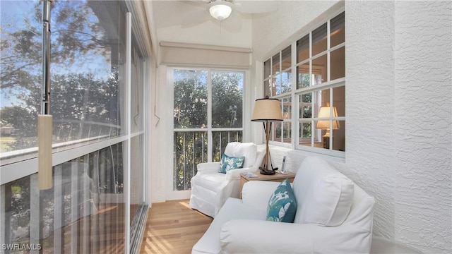 sunroom / solarium with ceiling fan