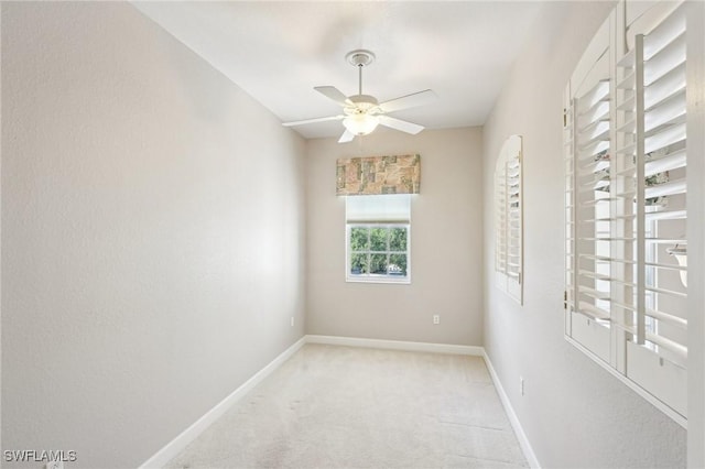 25970 Nesting Ct Unit 201, Bonita Springs, FL 34134 - carpeted spare room featuring a ceiling fan and baseboards