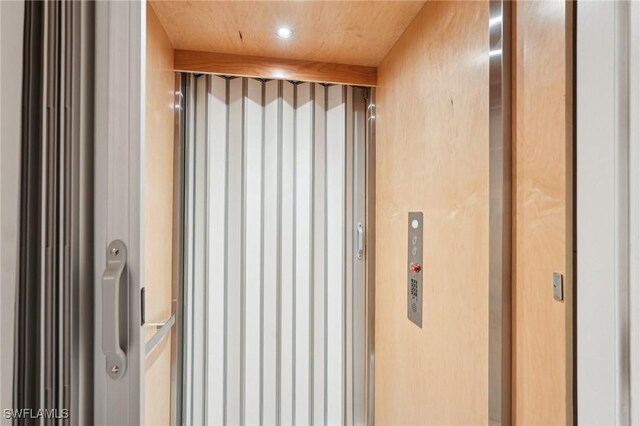 25970 Nesting Ct Unit 201, Bonita Springs, FL 34134 - elevator with recessed lighting