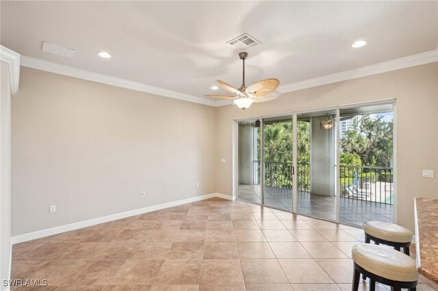 25970 Nesting Ct Unit 201, Bonita Springs, FL 34134 - empty room featuring a ceiling fan, ornamental molding, recessed lighting, light tile patterned flooring, and baseboards