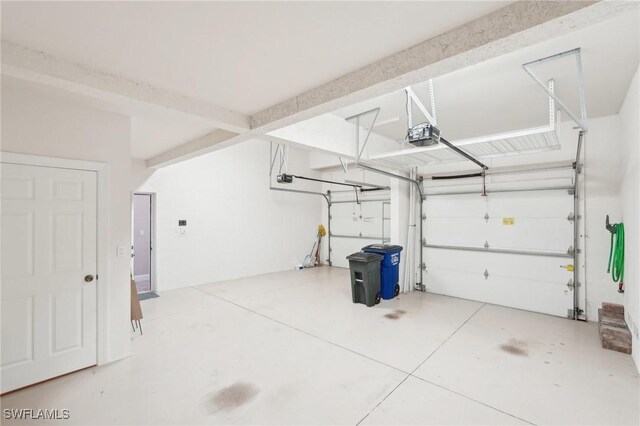 25970 Nesting Ct Unit 201, Bonita Springs, FL 34134 - garage featuring a garage door opener