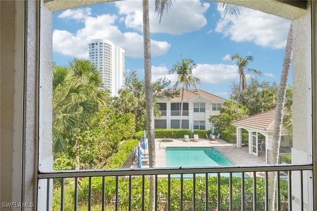 25970 Nesting Ct Unit 201, Bonita Springs, FL 34134 - community pool featuring a patio