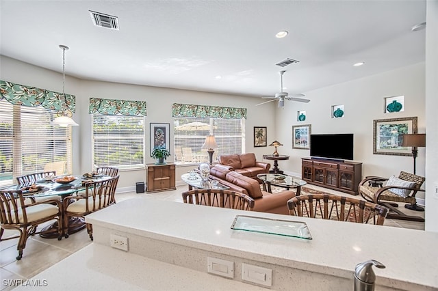 living room with ceiling fan