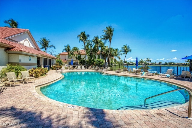 view of swimming pool featuring a patio