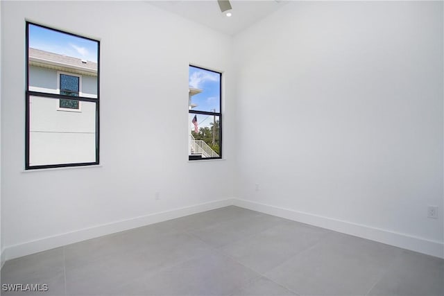 empty room featuring ceiling fan