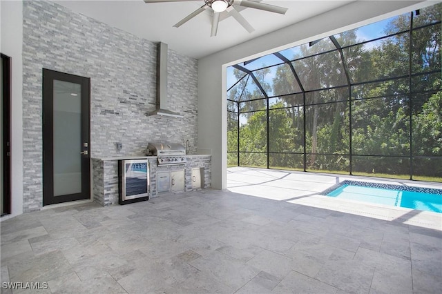 view of pool featuring grilling area and ceiling fan