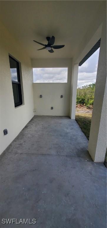 view of patio / terrace featuring ceiling fan