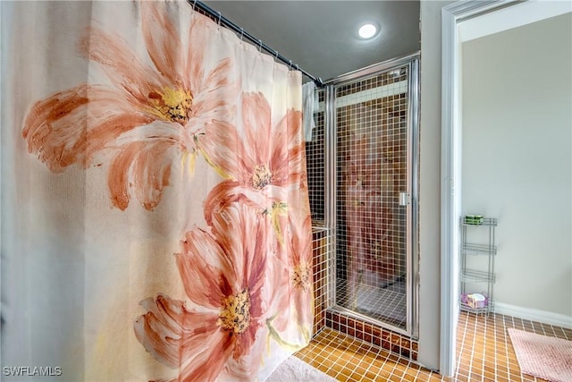 bathroom featuring a shower and tile patterned floors