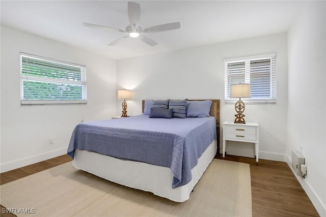 bedroom featuring ceiling fan and hardwood / wood-style floors