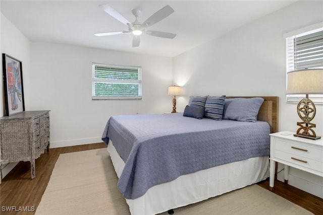 bedroom featuring ceiling fan and light hardwood / wood-style flooring