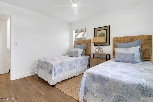 bedroom featuring ceiling fan and light hardwood / wood-style floors