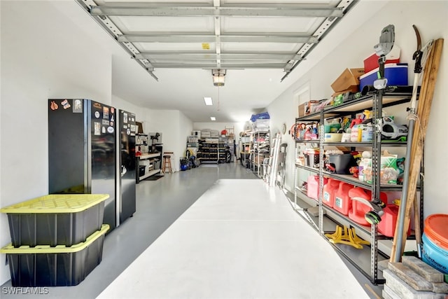 garage with black refrigerator