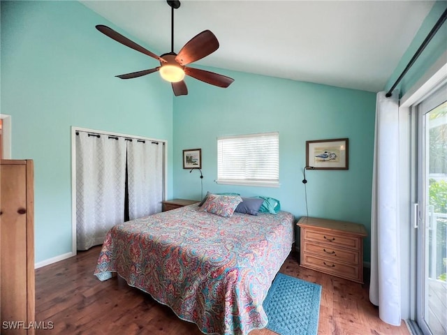 bedroom with hardwood / wood-style floors, ceiling fan, and vaulted ceiling