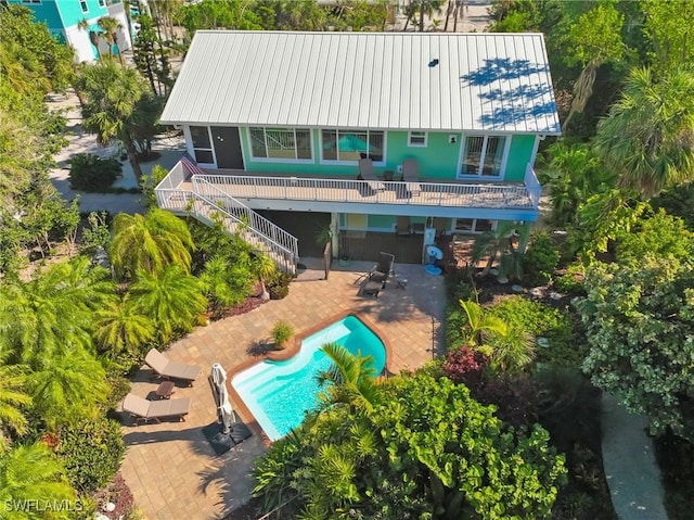 back of property with a patio area