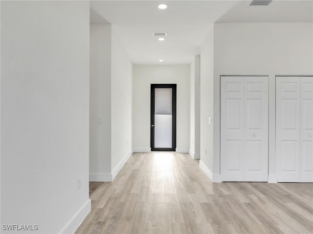 hall featuring light hardwood / wood-style floors