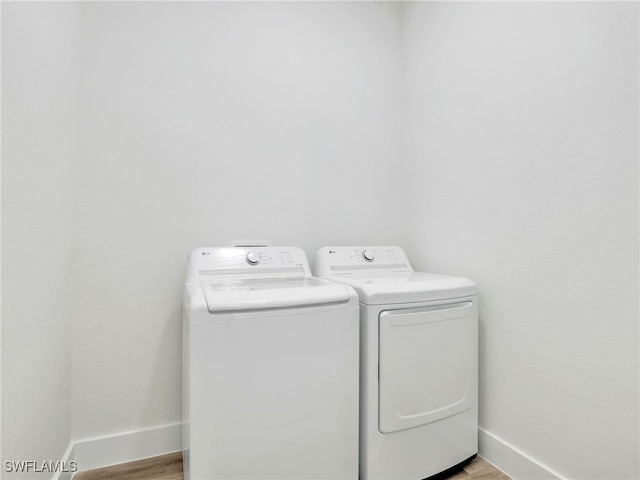 laundry area with washer and clothes dryer