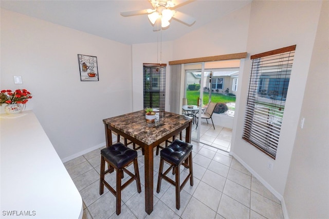 dining room featuring light tile patterned floors and ceiling fan